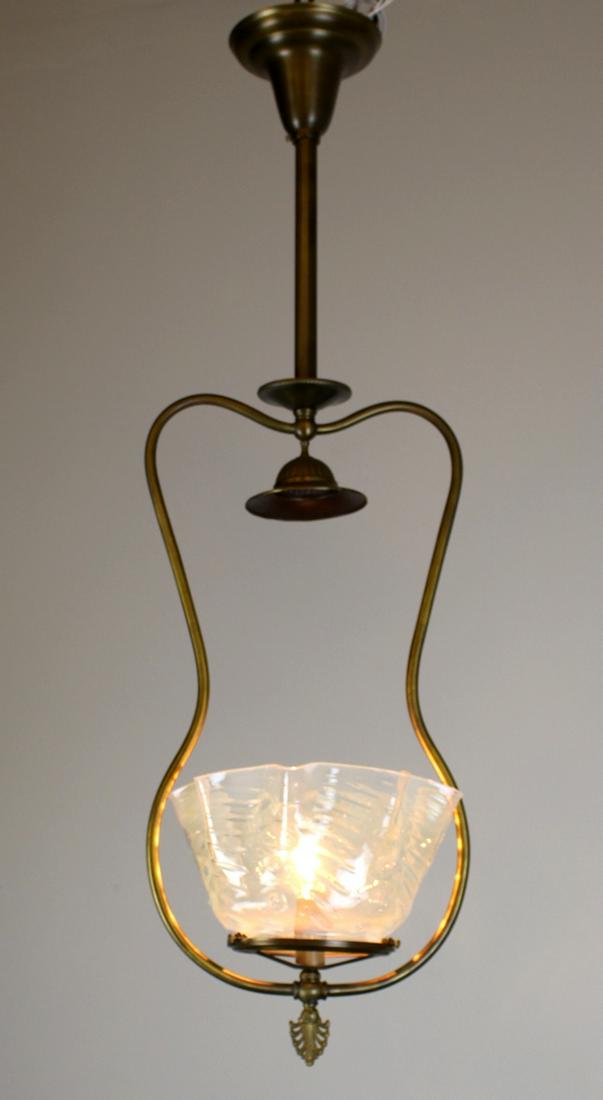 C. 1900 Converted Late Victorian Gas Hall Harp: Pretty Gas Hall Harp with interesting constant curved shape. Converted to electric, and fitted with a very pale blue opalescent ruffled shade. C. 1900. Meas: 34"L x 10"D
