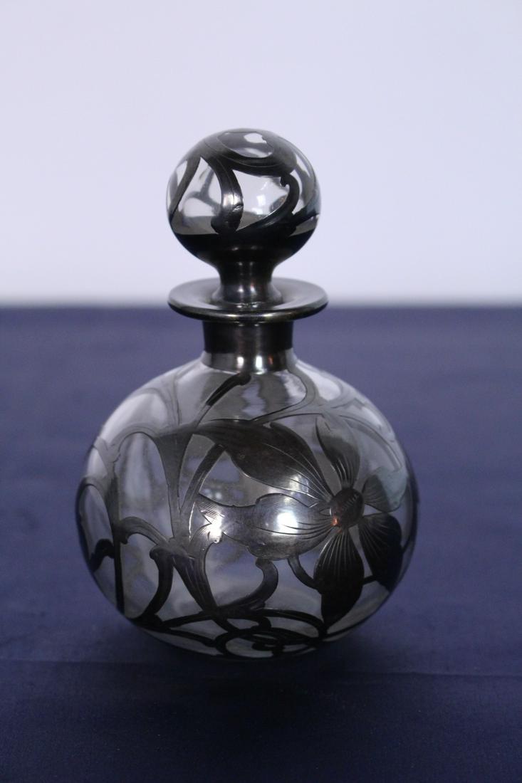 Victorian Glass and Silver Overlay Perfume Bottle: Victorian Glass and Silver Overlay Perfume Bottle with Stopper. Floral Motif. 4.25" x 3"D.