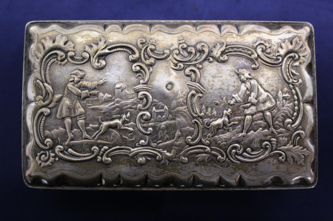 Dutch Silver Decorated Box: Dutch Silver Decorated Box with man and dog. 833 fineness. 1900 Export mark. 5.5"L x 3.5"W x 1.75"H.