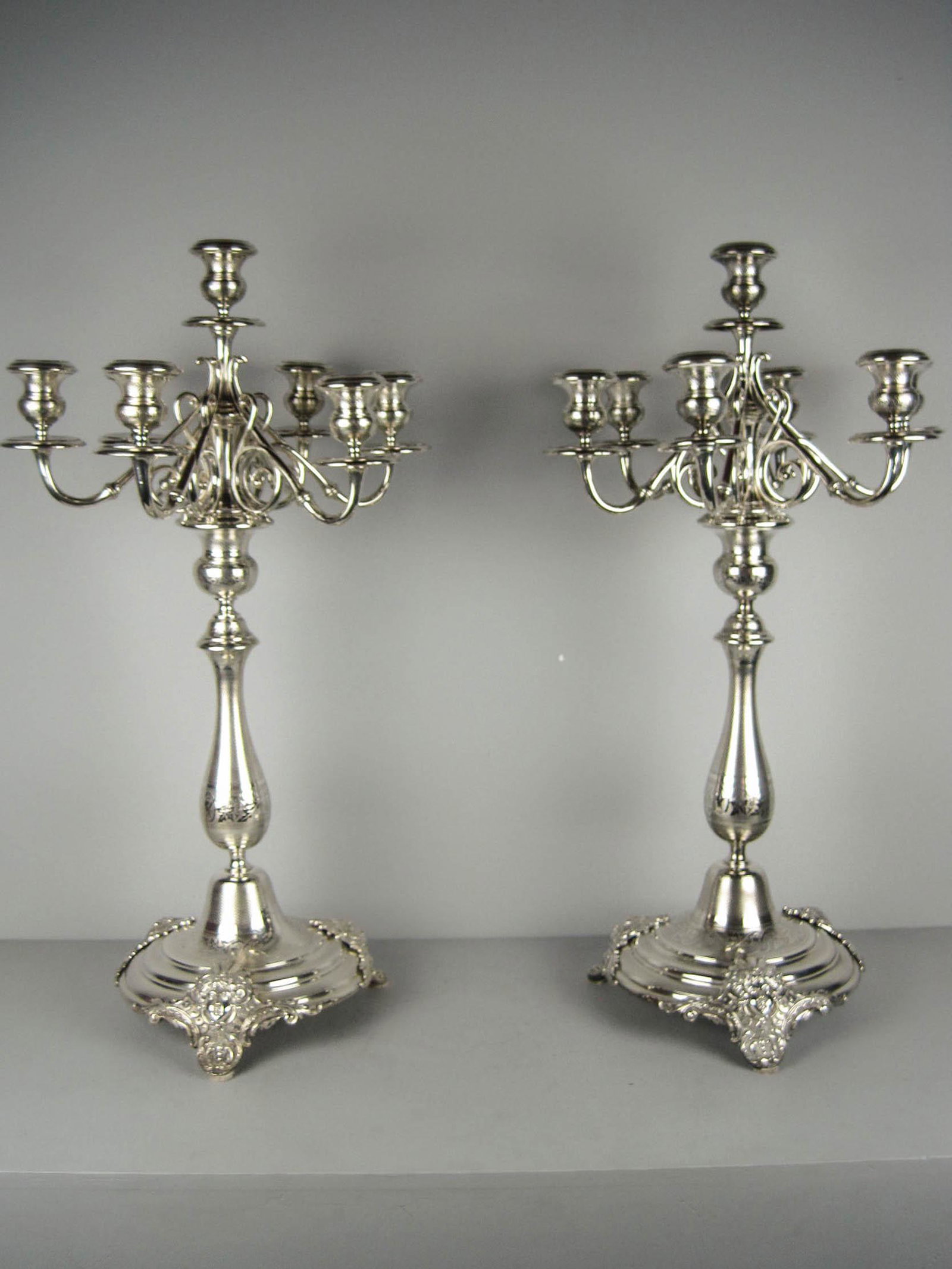 C. 1900 Large Pair of Figural SilverPlated Candelabra: Ca. 1900 Large Figural Pair of silver plated candelabra candlesticks. 29.5"H x 16"W.