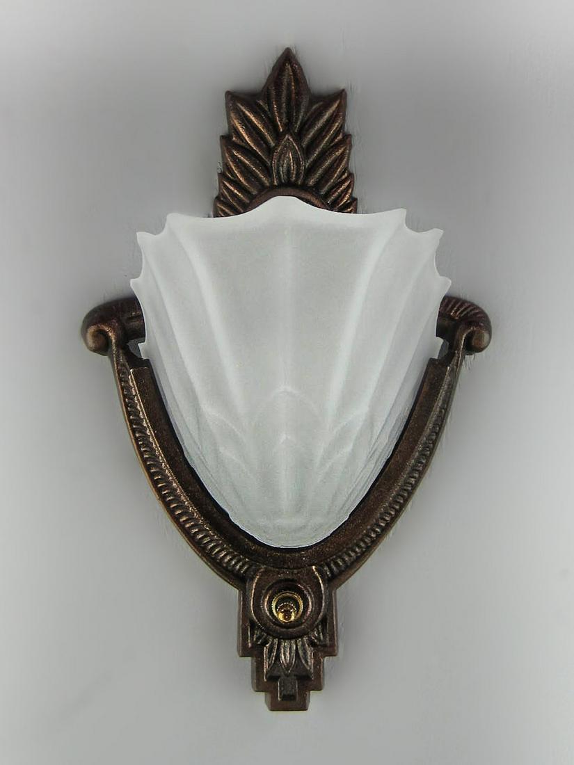 Pair of Art Deco Wall Sconces: RENEW Gallery's own authentic recreation of the Art Deco sconce, recast from the original castings, circa 1930. This beloved period of high design is captured in this wonderful wall mounted light. 10.