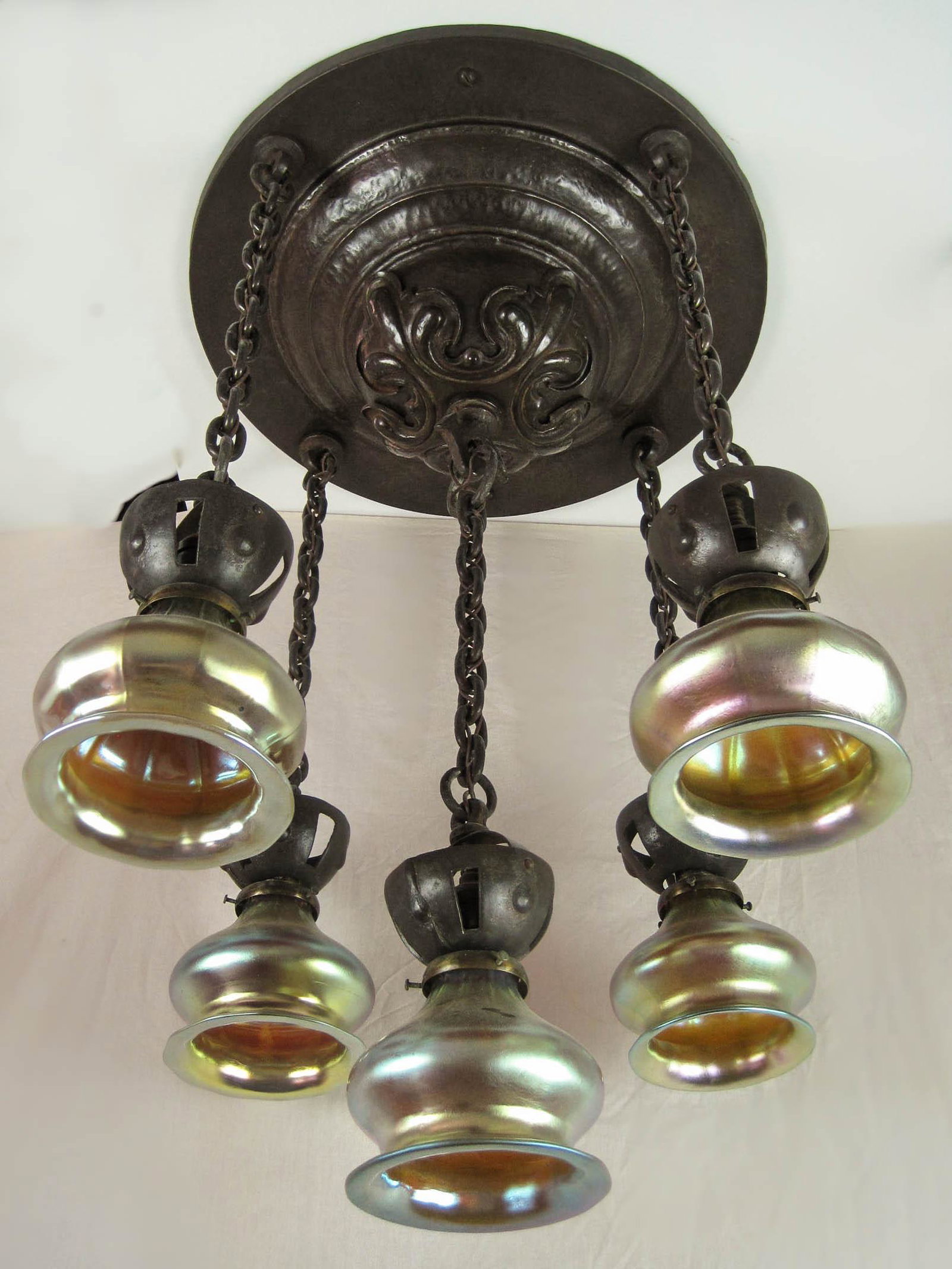 Hammered Flush Mount Light Fixture (5 Light): Ca. 1910 Hand hammered iron flush mount fixture with Gothic style decoration. Complete and original, this 5 light fixture has exceptional detail throughout. Note the correct chain and shade holders, c