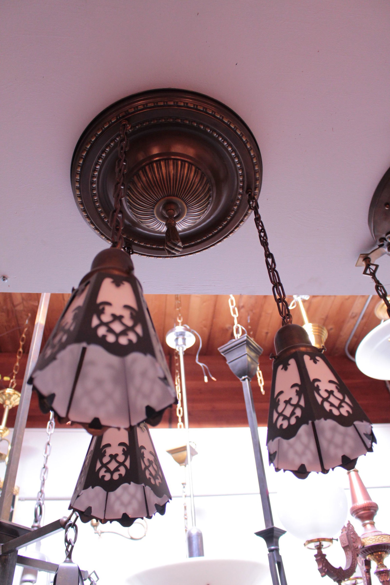 3 Light Flushmount Fixture: 3 Light Flushmount Fixture with Cutout Shades, c. 1915. Measures 22"H x 17"D.