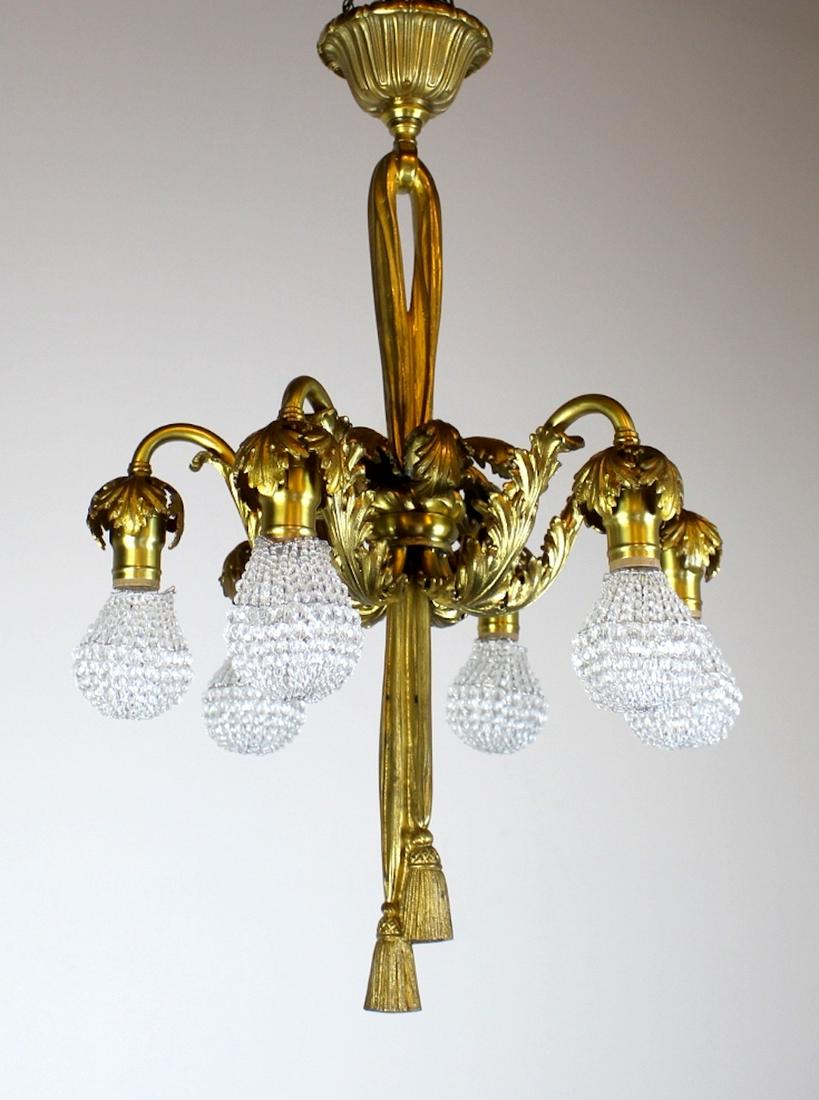 E.F.Caldwell Ormolu Chandelier: Early 1900's French Styled, 6 light Chandelier. Attributed to E.F.Caldwell. Attributed, as little of their work was signed. The bulk of it was custom made, so we rely on clues. The older picture in th