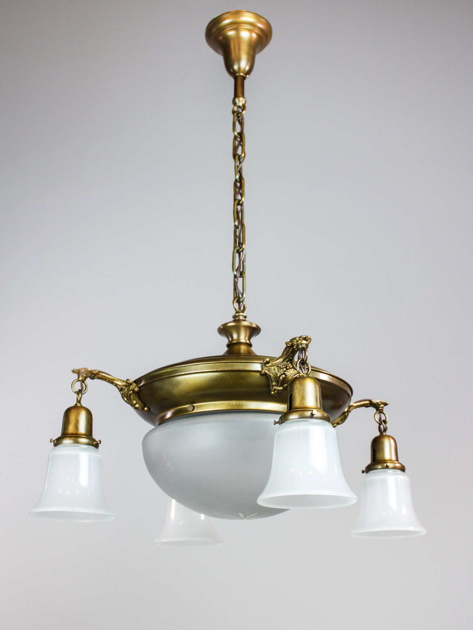 Original Etched Glass Pan Light Fixture (4+1Light): Ca. 1915 Original etched glass pan light fixture with large bowl decorated with stylized flowers. Fitted with recast bell shades on the surrounding four lights, restored antique finish. Rewired and re