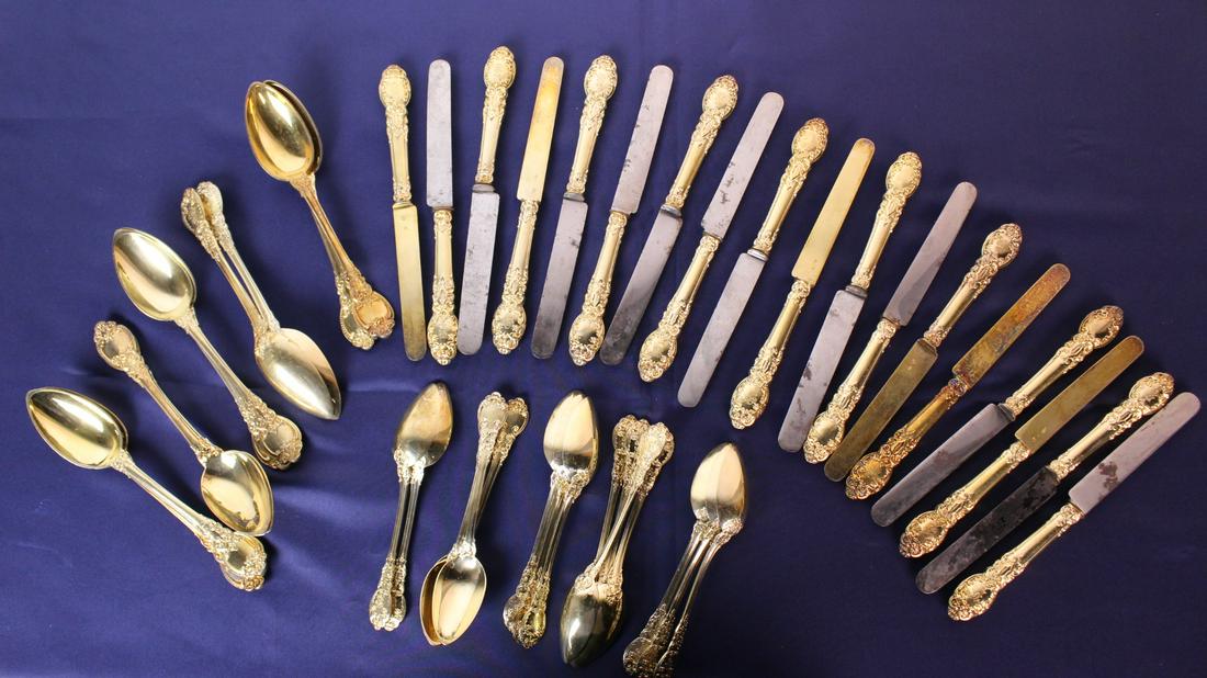 43 Pieces of Sterling Silver Tableware Gilt Finish: 43 Pieces of Sterling Silver Tableware. Gilt Finish. 15 tea spoons 6" x 1.25", 10 table spoons 7.5" x 1.5", 18 butter knives 8" x 1"