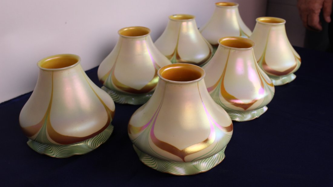Matched set of 7 Steuben Art Glass Shades: Matched set of 7 Steuben Art Glass Shades. Marked. Perfect condition, except for one small flea bite out of 1 fitter. Each is 4.5" H x 5"D (2.25"at fitter).