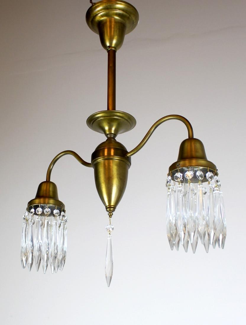 2 Light Arts and Crafts Style Pendant Fixture: Modest but sweet Two light Pendant Fixture in an Arts and Crafts Style. Decorated with crystalled shade holders and finished in a two tone antique satin brass. C 1915. Meas: 25"L x 19"D