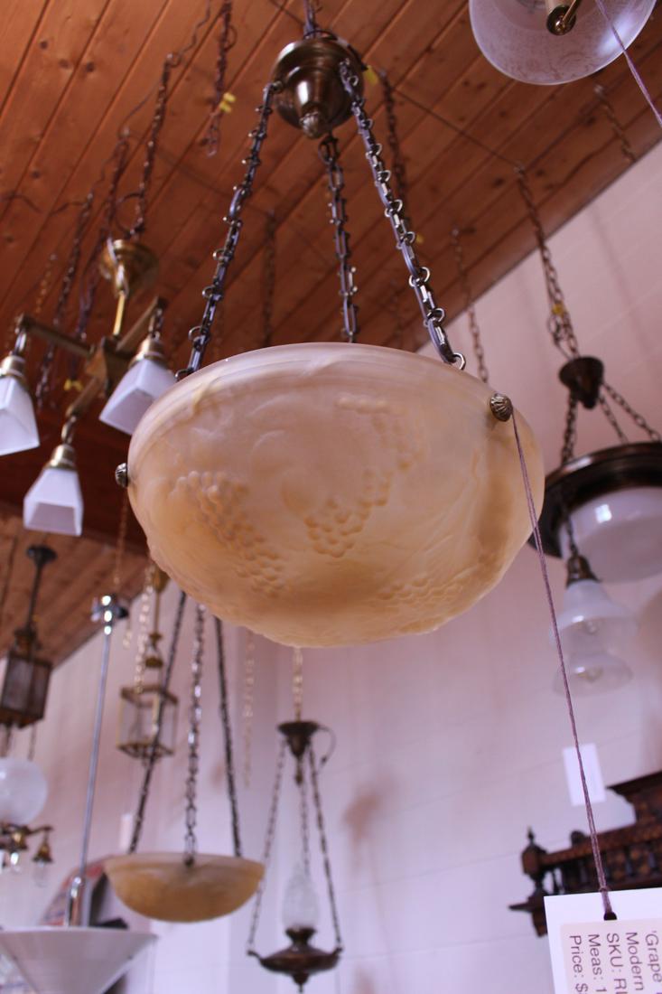 Re-Cast 20th Century Lalique Grape Bowl Light Fixture: Re-Cast 20th Century Lalique Grape Bowl Light Fixture. Amber bowls. Each measures 12"D x 6"H (body) x 36" H (drop).