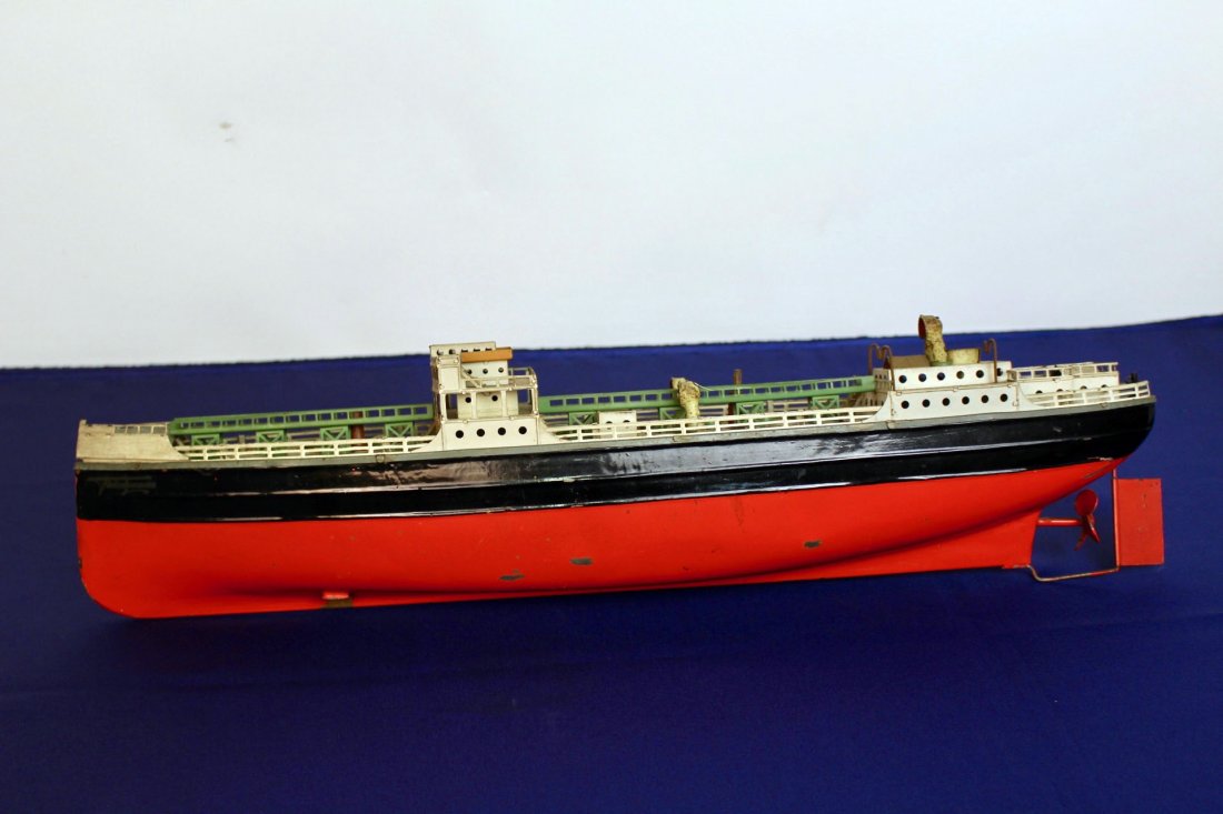 Oil Tanker by Fleichman of Germany: Unique tint pointed oil tanker by Fleichman of Germany. Original paint, delicate details, complete as found. Measures 20"L x 5.5"H x 4"W