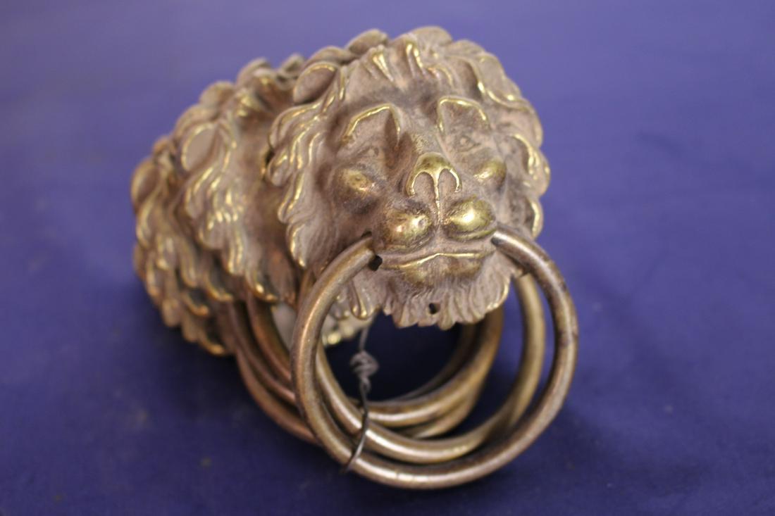 5 Antique Brass Lion Pulls C 1910: 5 Antique Brass Lion Pulls C 1910. Each is 5" x 3" (including ring).