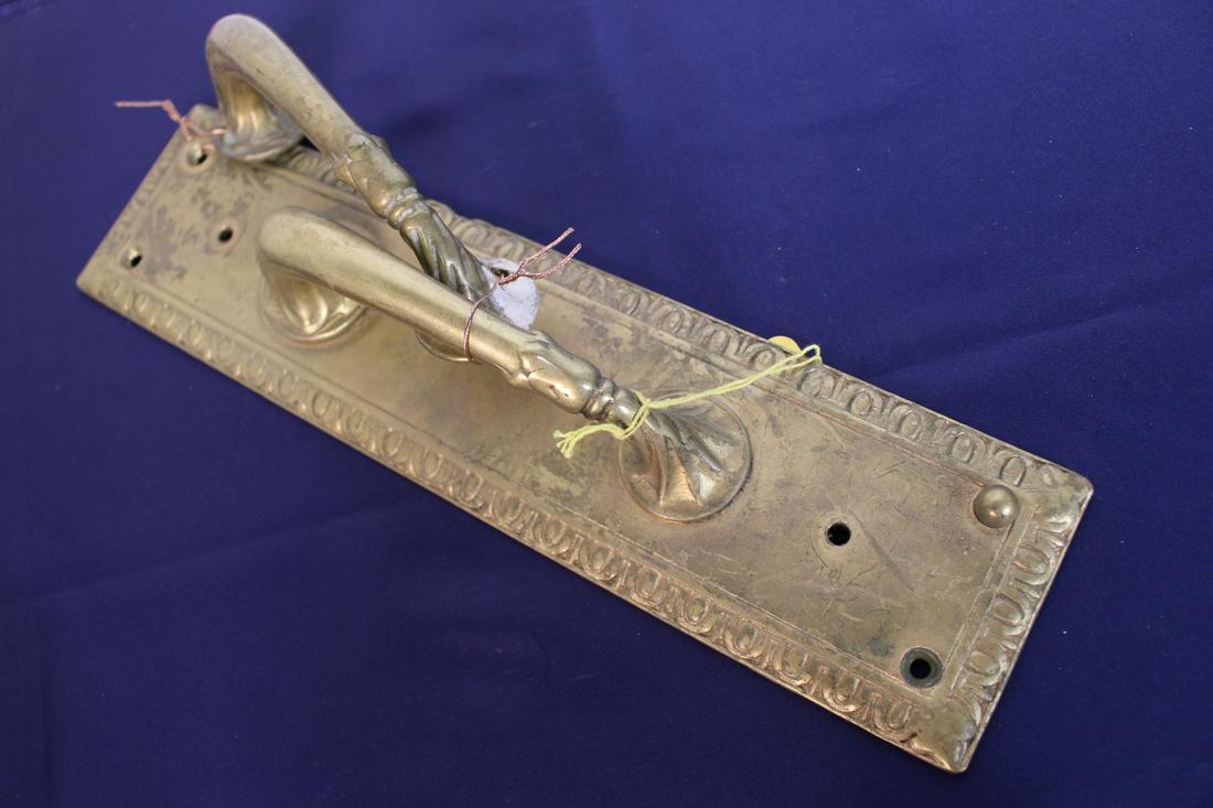 C. 1920 Brass Door Pull: Ca. 1920 Brass door pull, plated both exterior and interior, 14.8"H x 3.8"W