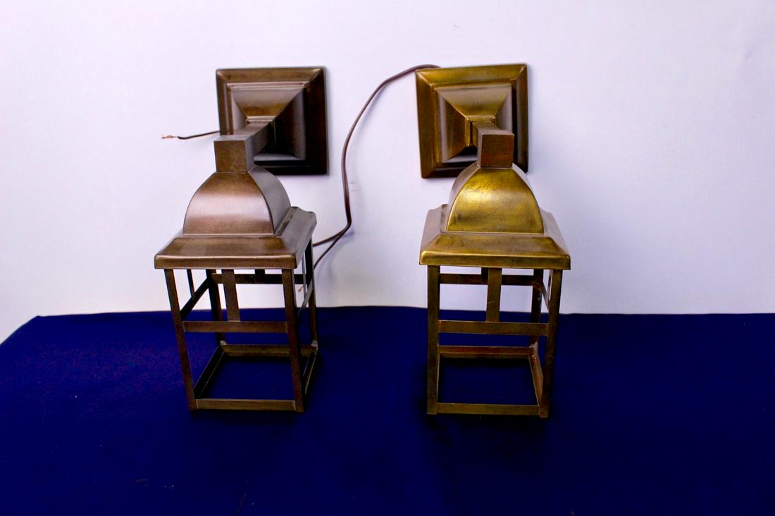 Pair of Arts and Crafts Wall Sconces: Pair of arts and crafts wall sconces with olive bronze finish. Each measures approximately 9" depth