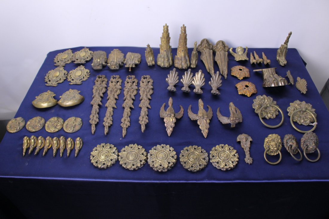 Antique Cast Bronze Furniture Fittings: Collection of antique cast bronze furniture fittings and pulls. They were salvaged from a repair store. 65 pieces in total. Varied dimensions.