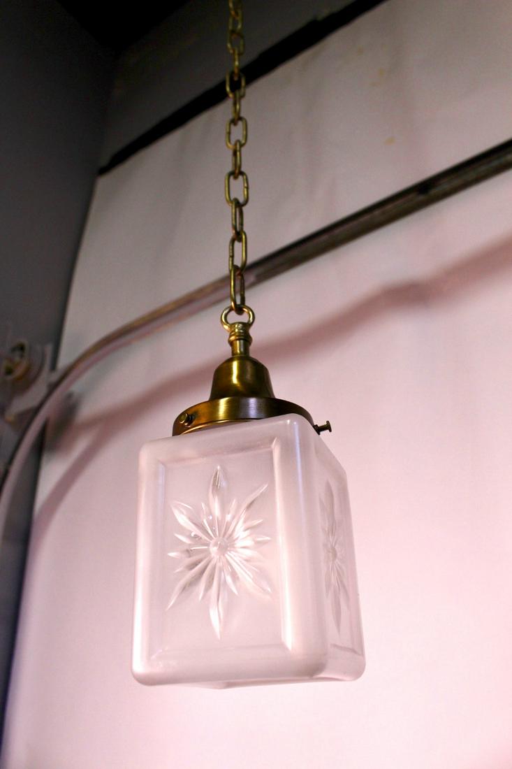 Pair of Mission Style Pendants with Shades: Pair of Mission Style Pendants with square frosted white shades with patterns. Each measures 29.5"H (chain included) x 4"Dia. Canopy will be provided.
