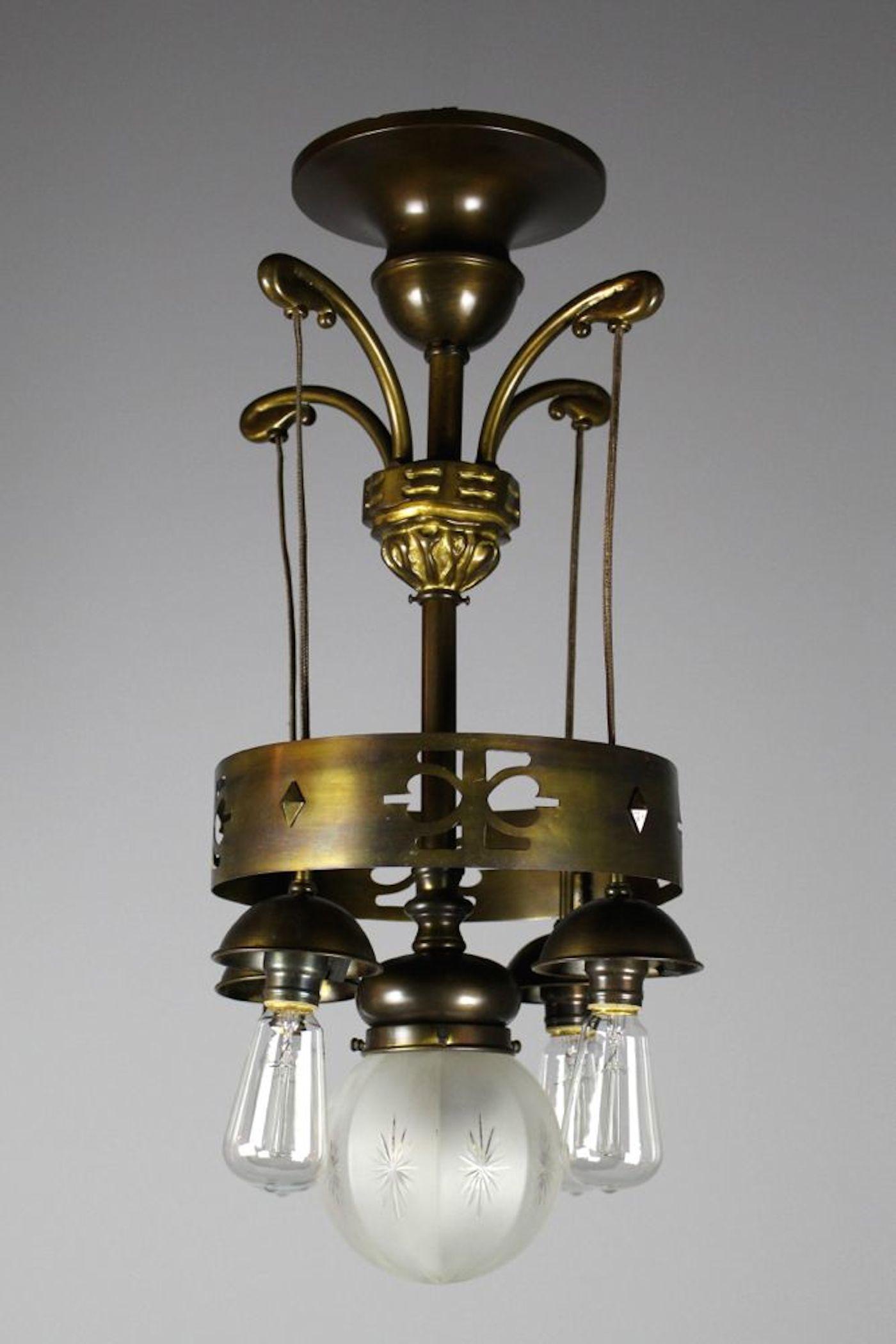 Rare Arts and Crafts Ringed Flushmount Fixture Attributed to Liberty (5 light): Circa 1910 A rare Arts and Crafts Flushmount 5 light attributed to Liberty. Rewired and ready to hang. Measurements: 28"H X 12"W