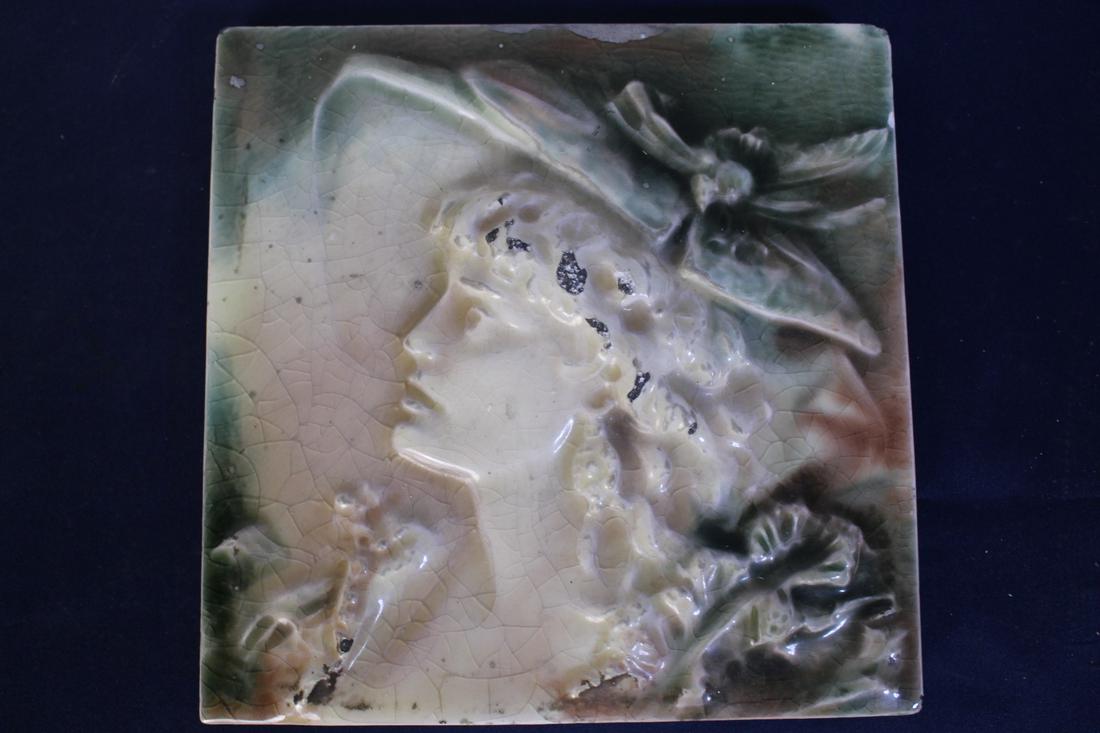 Antique Hamilton Glazed Tile with Raised Nymph: Antique Hamilton Glazed Tile with Raised Nymph, with Hamilton trademarks on the back, measures 6.25" x 6.25" x 0.25"