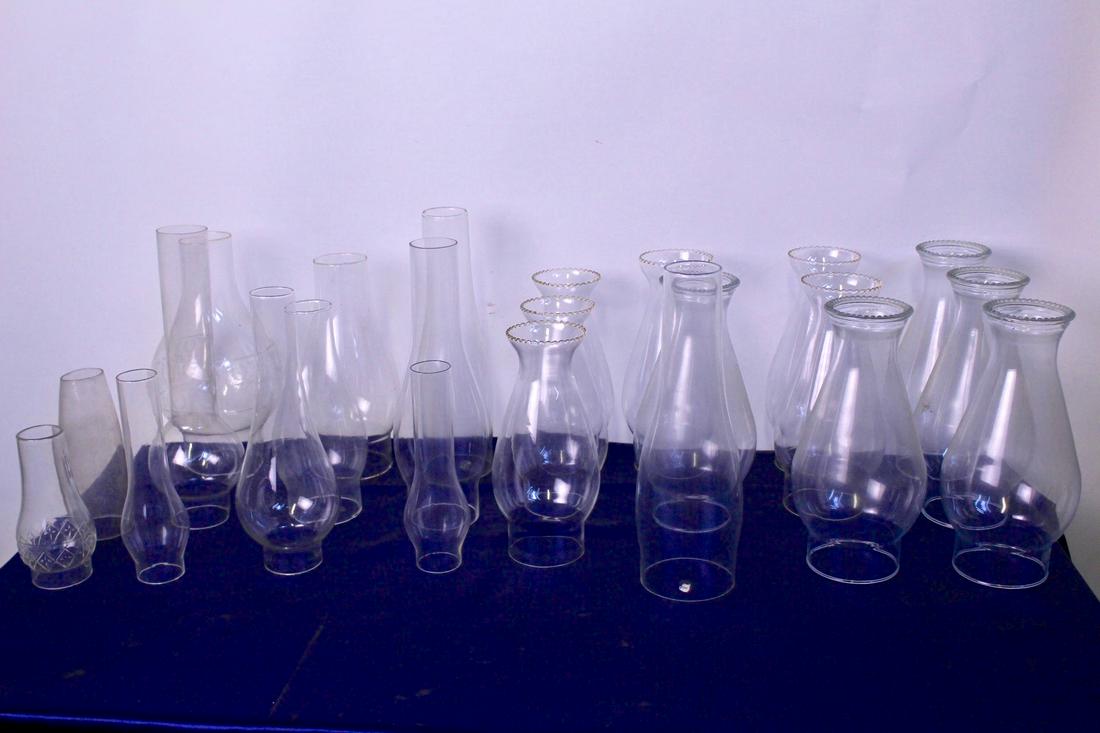 23 Original Oil Lamp Chimneys: 23 original Oil lamp chimneys, highest measures 10.5"H, shortest measures 5.25"H