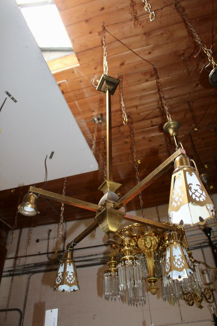 Circa 1915 4 Light Mission Fixture with Cut Out Shades: Circa 1915 4 light Mission fixture with 4 cut out shades. Measures 43"L x 37"Dia.