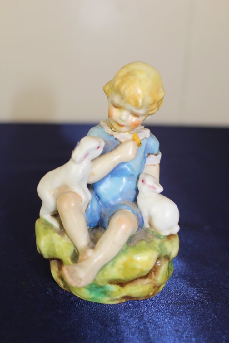 Royal Worcester the Dandelion Children Figurine with Rabbits: Royal Worcester the Dandelion Children Figurine with rabbits. English fine china, glazed decorated, modelled by F.G Doughty. Hallmark 3084. Circa 1935. Measures 4 1/2"H x 3"W x 3"Dia.