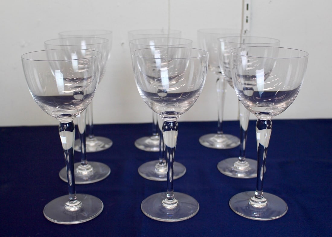 Saint Louis White Wine Glasses Etched On Bottom St LOUIS GLASSWARE: Set of 9 Saint Louis crystal white wine glasses. Etched on bottom St LOUIS GLASSWARE. Each glass measures 8"H x 3 1/2" Diameter. In excellent condition. The crystal Saint Louis is the oldest crystal g