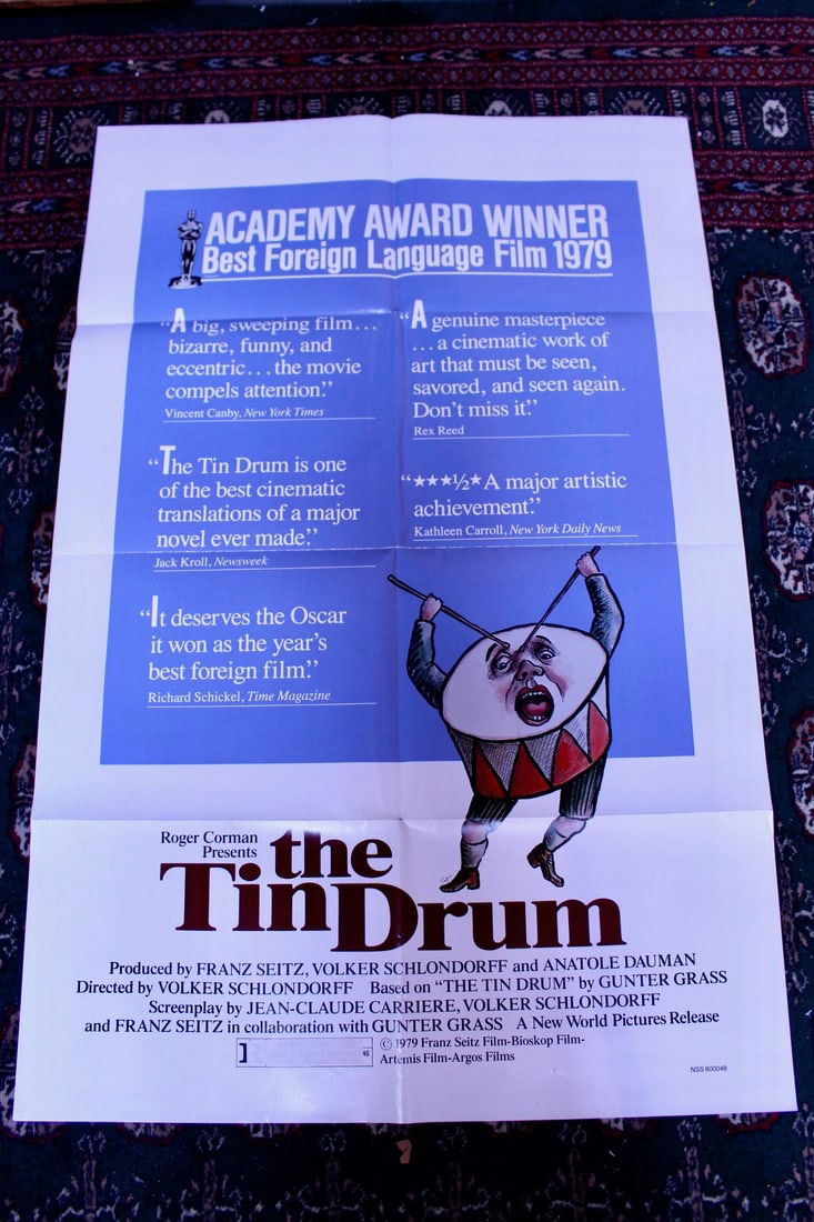 The Tin Drum Vintage Movie Poster 1979: The Tin Drum Vintage Movie Poster 1979. Single sided, folded as original issued. The Tin Drum is a 1979 film adaptation of the novel of the same name by Gunter Grass. It was directed and co-written by