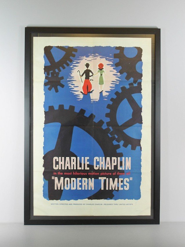 Charlie Chaplin "Modern Times" Poster: Ca. 1935 Vintage movie poster for the Charlie Chaplin silent film "Modern Times" which is the story of a "Tramp" who struggles to survive in the modern machine era. Measurements: 41"H X 24"W (unframed
