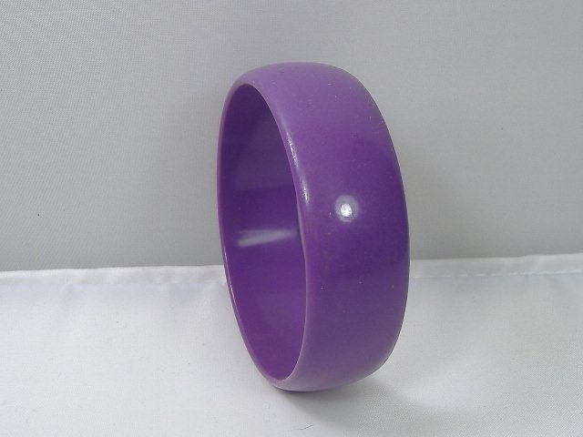 Vintage Lucite Bangle Bracelet: Vintage Lucite Bangle Bracelet. Manufactured by Best Plastics of Providence RI in the 1970s. Measures approx. 2 3/4 inches at it's maximum width