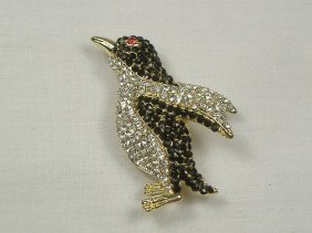 Ann Primrose Crystalleria Designer Pin/Brooch: From the Ann Primrose Collection comes this opportunity to own a masterpiece! Chunky, Attention grabbing, and sleek, this pin will be the talk of any gathering! The angular crystals glare as light hit