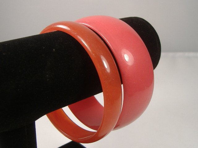 Set of 2 Vintage Lucite Bangle Bracelets: 2 Vintage Lucite Bangle Bracelets. Manufactured by Best Plastics of Providence RI in the 1970s. Measures approx. 2 3/4 inches at their maximum width