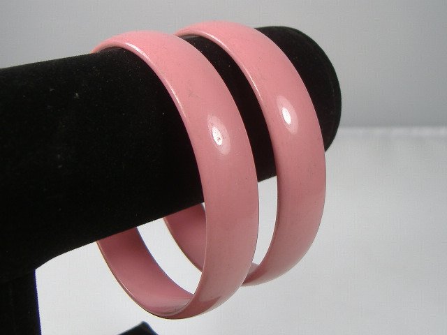 Set of 2 Vintage Lucite Bangle Bracelets: 2 Vintage Lucite Bangle Bracelets. Manufactured by Best Plastics of Providence RI in the 1970s. Measures approx. 2 3/4 inches at their maximum width