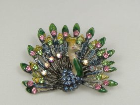 Ann Primrose Crystalleria Designer Pin/Brooch: From the Ann Primrose Collection comes this opportunity to own a masterpiece! Chunky, Attention grabbing, and sleek, this pin will be the talk of any gathering! The angular crystals glare as light hit