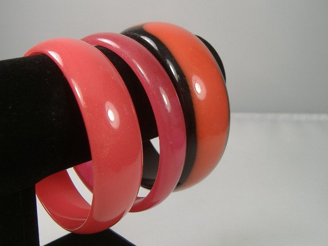 Set of 3 Vintage Lucite Bangle Bracelets: 3 Vintage Lucite Bangle Bracelets. Manufactured by Best Plastics of Providence RI in the 1970s. Measures approx. 2 3/4 inches at their maximum width