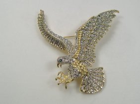 Ann Primrose Crystalleria Designer Pin/Brooch: From the Ann Primrose Collection comes this opportunity to own a masterpiece! Chunky, Attention grabbing, and sleek, this pin will be the talk of any gathering! The angular crystals glare as light hit