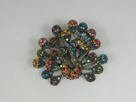 Ann Primrose Crystalleria Designer Pin/Brooch: From the Ann Primrose Collection comes this opportunity to own a masterpiece! Chunky, Attention grabbing, and sleek, this pin will be the talk of any gathering! The angular crystals glare as light hit