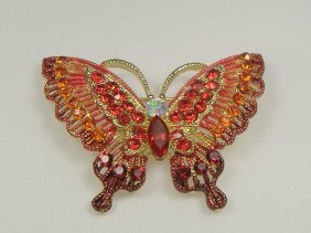 Ann Primrose Crystalleria Designer Pin/Brooch: From the Ann Primrose Collection comes this opportunity to own a masterpiece! Chunky, Attention grabbing, and sleek, this pin will be the talk of any gathering! The angular crystals glare as light hit