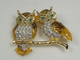 Ann Primrose Crystalleria Designer Pin/Brooch: From the Ann Primrose Collection comes this opportunity to own a masterpiece! Chunky, Attention grabbing, and sleek, this pin will be the talk of any gathering! The angular crystals glare as light hit