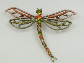 Ann Primrose Crystalleria Designer Pin/Brooch: From the Ann Primrose Collection comes this opportunity to own a masterpiece! Chunky, Attention grabbing, and sleek, this pin will be the talk of any gathering! The angular crystals glare as light hit