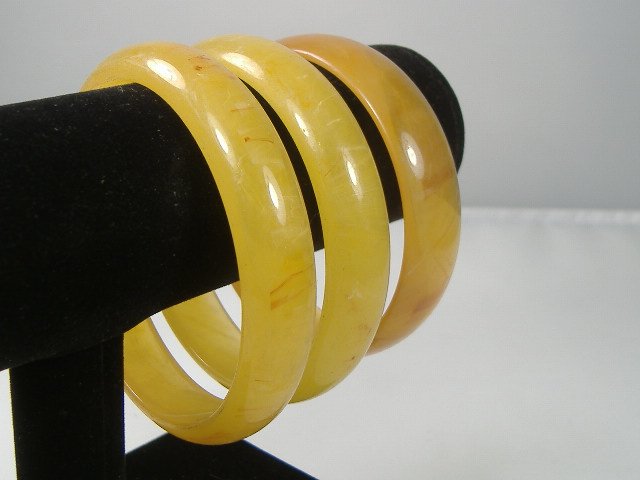 Set of 3 Vintage Lucite Bangle Bracelets: 3 Vintage Lucite Bangle Bracelets. Manufactured by Best Plastics of Providence RI in the 1970s. Measures approx. 2 3/4 inches at their maximum width