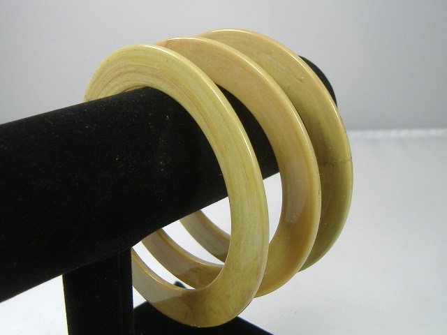 Set of 3 Vintage Lucite Bangle Bracelets: 3 Vintage Lucite Bangle Bracelets. Manufactured by Best Plastics of Providence RI in the 1970s. Measures approx. 2 3/4 inches at their maximum width