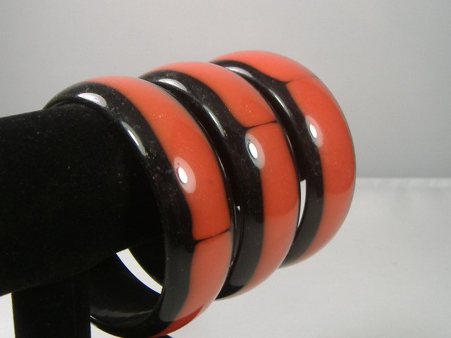 Set of 3 Vintage Lucite Bangle Bracelets: 3 Vintage Lucite Bangle Bracelets. Manufactured by Best Plastics of Providence RI in the 1970s. Measures approx. 2 3/4 inches at their maximum width