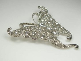 Ann Primrose Crystalleria Designer Pin/Brooch: From the Ann Primrose Collection comes this opportunity to own a masterpiece! Chunky, Attention grabbing, and sleek, this pin will be the talk of any gathering! The angular crystals glare as light hit
