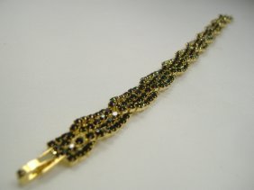 Ann Primrose Crystalleria Designer Tennis Bracelet: From the Ann Primrose Collection comes this opportunity to own a masterpiece! Chunky, Attention grabbing, and sleek, this bangle will be the talk of any gathering! The angular crystals glare as light 