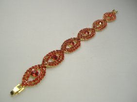Ann Primrose Crystalleria Designer Tennis Bracelet: From the Ann Primrose Collection comes this opportunity to own a masterpiece! Chunky, Attention grabbing, and sleek, this bangle will be the talk of any gathering! The angular crystals glare as light 