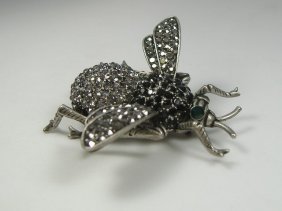 Crystalleria Designer Pin/Brooch: From the Ann Primrose Collection comes this opportunity to own a masterpiece! Chunky, Attention grabbing, and sleek, this pin will be the talk of any gathering! The angular crystals glare as light hit