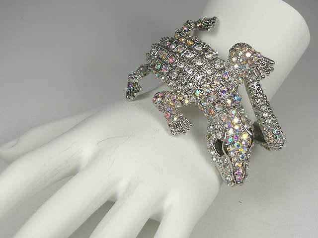 Swarovski Crystal Element Alligator Bangle Bracelet: This bangle bracelet is a hinged design and will open to fit any size wrist. Gorgeous, bright Austrian Crystals in this piece