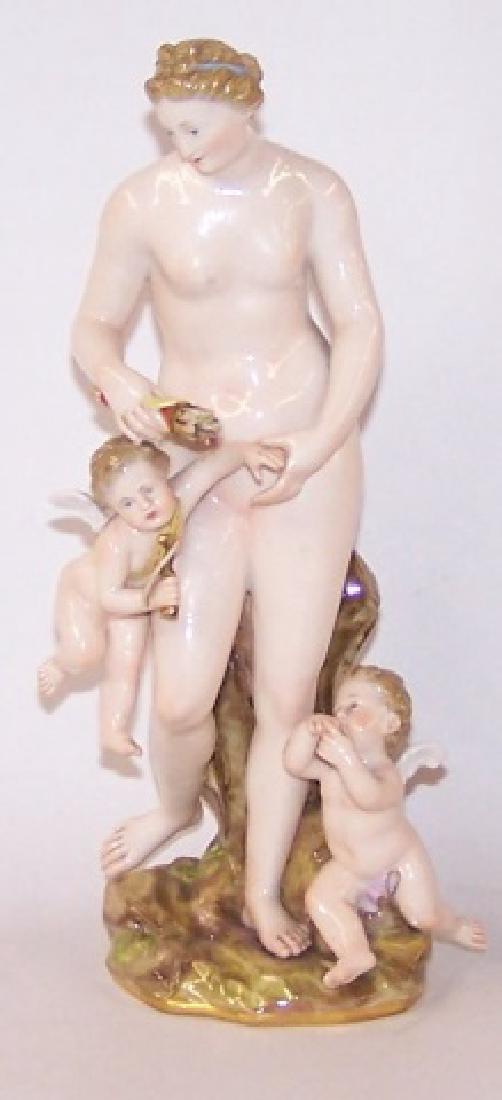 *MEISSEN FIGURAL GROUP: Nude Venus with putti attendants, marked with crossed swords, approximate height 9 1/4".