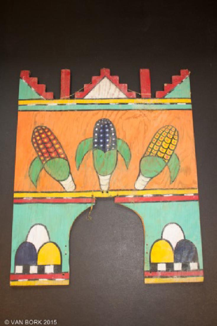 *HOPI TABLITA: Corn and clouds on front, butterfly and flowers on back, approximate height 17 5/8", width 14 3/4". Lots 2001 thru 2073 of this Native American auction are from the estate of photographer, artist and 