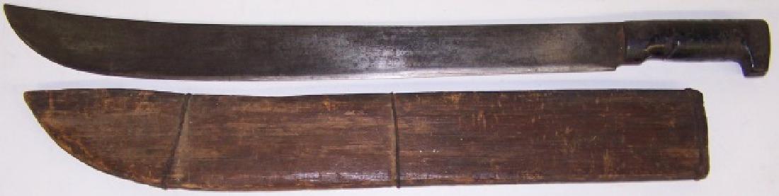 *MACHETE: Marked indistinctly on blade, possibly from Spanish American War, with wood sheath.