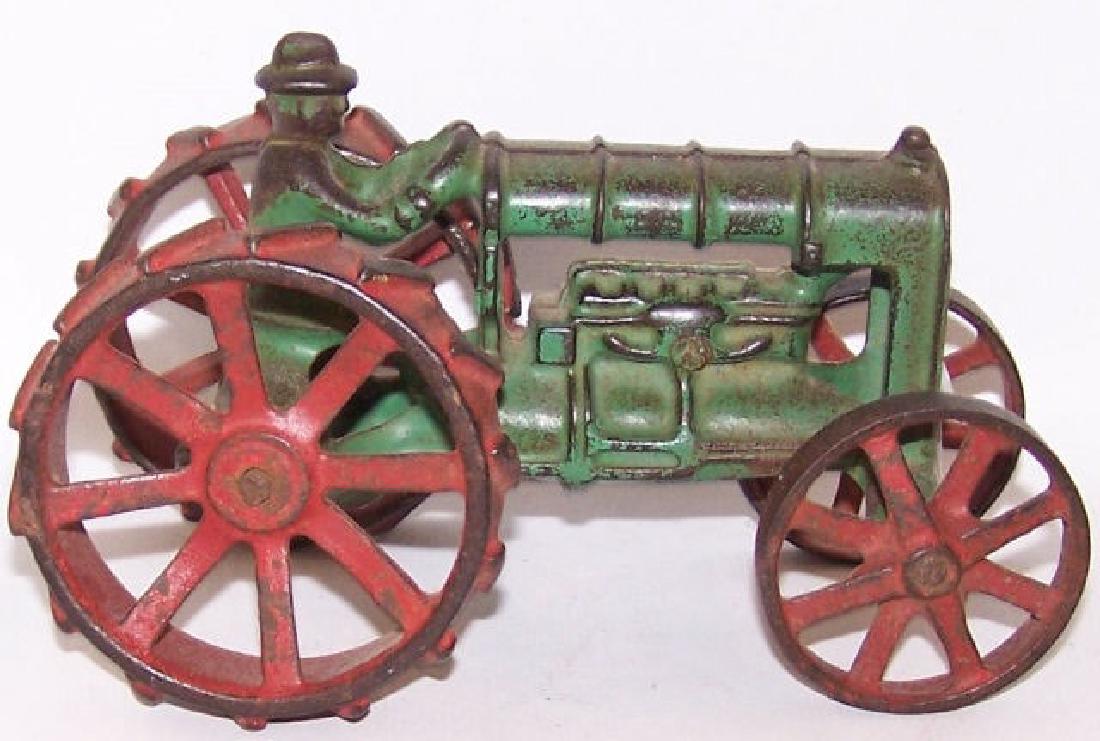 *CAST IRON TRACTOR: Approximate length 5 3/4", height 3 1/2".